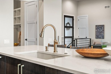 Step into this brand-new paired ranch home at Morning Song on Harmony Golf Club in Colorado - for sale on GolfHomes.com, golf home, golf lot