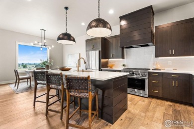 Step into this brand-new paired ranch home at Morning Song on Harmony Golf Club in Colorado - for sale on GolfHomes.com, golf home, golf lot