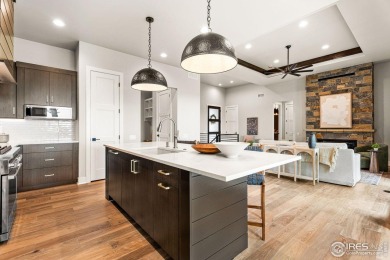Step into this brand-new paired ranch home at Morning Song on Harmony Golf Club in Colorado - for sale on GolfHomes.com, golf home, golf lot