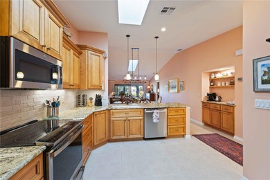 Discover relaxed WATERFRONT living in this beautifully updated on Saint Andrews South Golf Club in Florida - for sale on GolfHomes.com, golf home, golf lot