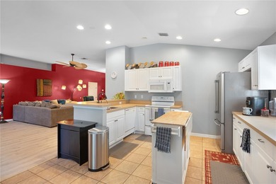 Welcome to this beautifully maintained waterfront home in on Palmetto-Pine Country Club in Florida - for sale on GolfHomes.com, golf home, golf lot