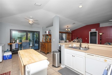 Welcome to this beautifully maintained waterfront home in on Palmetto-Pine Country Club in Florida - for sale on GolfHomes.com, golf home, golf lot