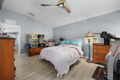 Welcome to this beautifully maintained waterfront home in on Palmetto-Pine Country Club in Florida - for sale on GolfHomes.com, golf home, golf lot