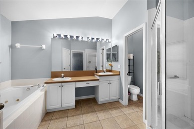 Welcome to this beautifully maintained waterfront home in on Palmetto-Pine Country Club in Florida - for sale on GolfHomes.com, golf home, golf lot