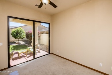 Situated in a peaceful cul-de-sac, this stunning 3-bedroom on London Bridge Golf Course in Arizona - for sale on GolfHomes.com, golf home, golf lot