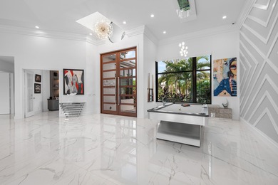 TURNKEY sophisticated luxury offering a true move-in-ready on Bocaire Country Club in Florida - for sale on GolfHomes.com, golf home, golf lot