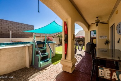 Situated in a peaceful cul-de-sac, this stunning 3-bedroom on London Bridge Golf Course in Arizona - for sale on GolfHomes.com, golf home, golf lot