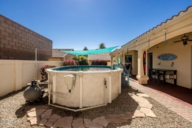 Situated in a peaceful cul-de-sac, this stunning 3-bedroom on London Bridge Golf Course in Arizona - for sale on GolfHomes.com, golf home, golf lot