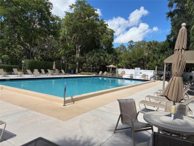 Spectacular Golf and Sunset views from this spacious 2/2 updated on Palm-Aire Country Club and Resort - The Oaks in Florida - for sale on GolfHomes.com, golf home, golf lot