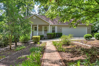 A MUST SEE! This private and upgraded home is set back from the on Monticello Golf Club At Savannah Lakes in South Carolina - for sale on GolfHomes.com, golf home, golf lot