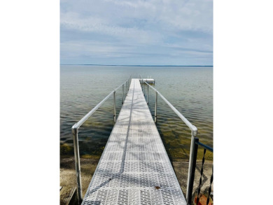 Charming Houghton Lake Waterfront Cottage - Move-In Ready with on Pine View Highlands Golf Course in Michigan - for sale on GolfHomes.com, golf home, golf lot
