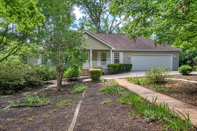 A MUST SEE! This private and upgraded home is set back from the on Monticello Golf Club At Savannah Lakes in South Carolina - for sale on GolfHomes.com, golf home, golf lot