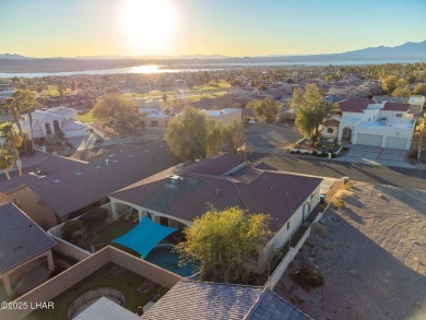 Situated in a peaceful cul-de-sac, this stunning 3-bedroom on London Bridge Golf Course in Arizona - for sale on GolfHomes.com, golf home, golf lot