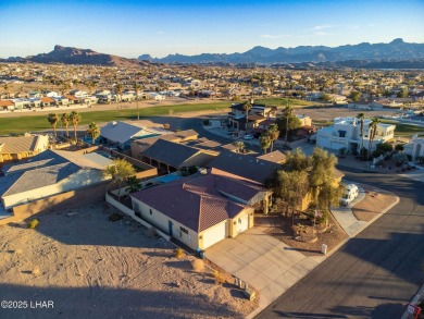 Situated in a peaceful cul-de-sac, this stunning 3-bedroom on London Bridge Golf Course in Arizona - for sale on GolfHomes.com, golf home, golf lot