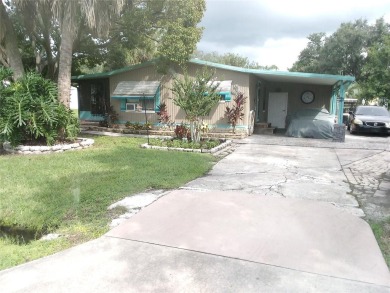 This mobile home has 2 beds and 2 baths sitting on 6,526 sqft on Continental Country Club in Florida - for sale on GolfHomes.com, golf home, golf lot