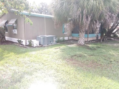 This mobile home has 2 beds and 2 baths sitting on 6,526 sqft on Continental Country Club in Florida - for sale on GolfHomes.com, golf home, golf lot