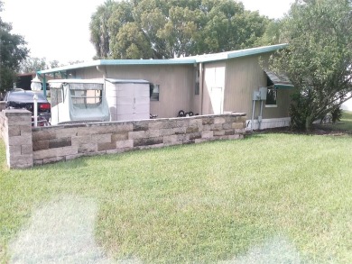 This mobile home has 2 beds and 2 baths sitting on 6,526 sqft on Continental Country Club in Florida - for sale on GolfHomes.com, golf home, golf lot