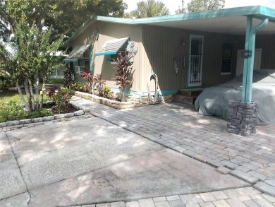 This mobile home has 2 beds and 2 baths sitting on 6,526 sqft on Continental Country Club in Florida - for sale on GolfHomes.com, golf home, golf lot