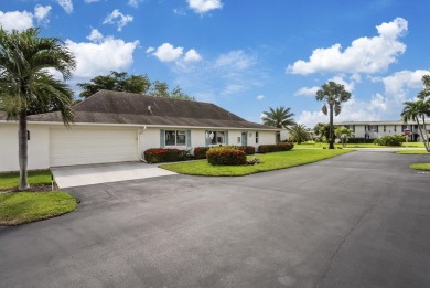 This is your chance to own an updated Villa with a TWO car on The Glades Golf and Country Club in Florida - for sale on GolfHomes.com, golf home, golf lot