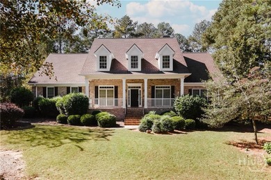 Experience timeless style and easy living in this beautifully on  in Georgia - for sale on GolfHomes.com, golf home, golf lot