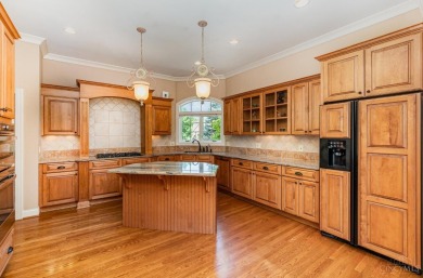 Luxury living with panoramic golf course views! Custom built by on Four Bridges Country Club in Ohio - for sale on GolfHomes.com, golf home, golf lot
