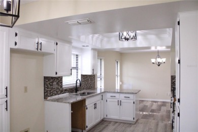 Short Sale. Price Improved! Welcome to 2501 Lonigan Place in the on Falcon Watch Golf Club in Florida - for sale on GolfHomes.com, golf home, golf lot