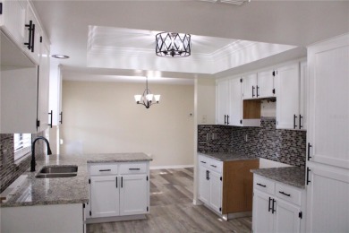 Short Sale. Price Improved! Welcome to 2501 Lonigan Place in the on Falcon Watch Golf Club in Florida - for sale on GolfHomes.com, golf home, golf lot