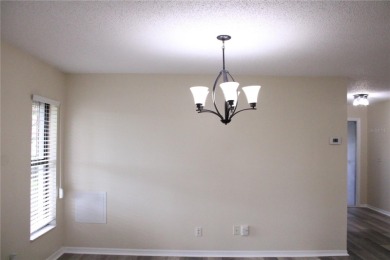 Short Sale. Price Improved! Welcome to 2501 Lonigan Place in the on Falcon Watch Golf Club in Florida - for sale on GolfHomes.com, golf home, golf lot