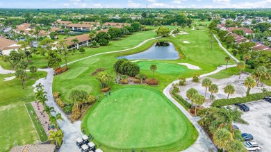 Experience the best of Jupiter living in this lovely very on The Golf Club of Jupiter in Florida - for sale on GolfHomes.com, golf home, golf lot