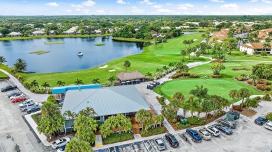 Experience the best of Jupiter living in this lovely very on The Golf Club of Jupiter in Florida - for sale on GolfHomes.com, golf home, golf lot