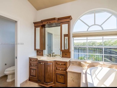 New pics coming soon! Welcome to this luxurious home featuring on Weston Hills Country Club in Florida - for sale on GolfHomes.com, golf home, golf lot