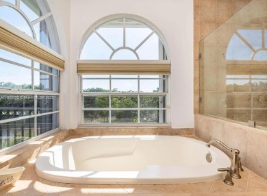 New pics coming soon! Welcome to this luxurious home featuring on Weston Hills Country Club in Florida - for sale on GolfHomes.com, golf home, golf lot