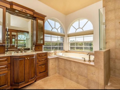 New pics coming soon! Welcome to this luxurious home featuring on Weston Hills Country Club in Florida - for sale on GolfHomes.com, golf home, golf lot