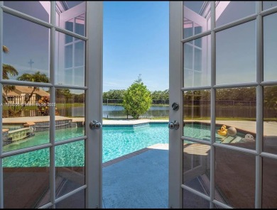 New pics coming soon! Welcome to this luxurious home featuring on Weston Hills Country Club in Florida - for sale on GolfHomes.com, golf home, golf lot