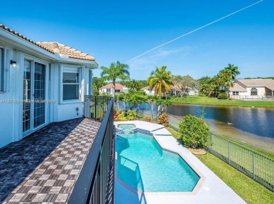 New pics coming soon! Welcome to this luxurious home featuring on Weston Hills Country Club in Florida - for sale on GolfHomes.com, golf home, golf lot