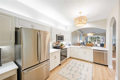 Welcome to this beautifully updated two-bedroom plus den villa on Plantation Golf and Country Club in Florida - for sale on GolfHomes.com, golf home, golf lot