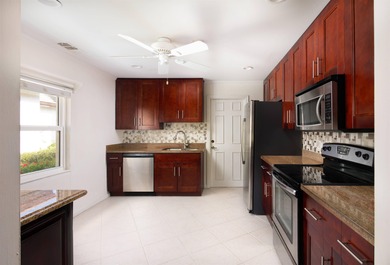 Welcome to this inviting single-story residence in the highly on PGA National Golf Club in Florida - for sale on GolfHomes.com, golf home, golf lot