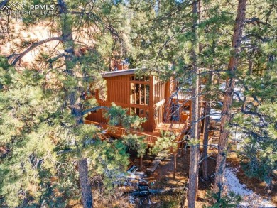 This stunning home sits on over 1 acre of land backing to open on Perry Park Country Club in Colorado - for sale on GolfHomes.com, golf home, golf lot