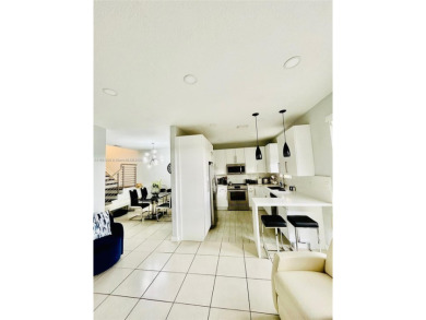 Beautiful and remodeled townhouse with 4 bedrooms and 3 full on Country Club of Miami in Florida - for sale on GolfHomes.com, golf home, golf lot