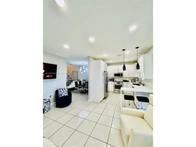 Beautiful and remodeled townhouse with 4 bedrooms and 3 full on Country Club of Miami in Florida - for sale on GolfHomes.com, golf home, golf lot