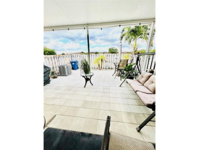 Beautiful and remodeled townhouse with 4 bedrooms and 3 full on Country Club of Miami in Florida - for sale on GolfHomes.com, golf home, golf lot