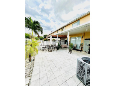 Beautiful and remodeled townhouse with 4 bedrooms and 3 full on Country Club of Miami in Florida - for sale on GolfHomes.com, golf home, golf lot