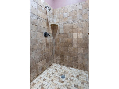 Exceptional location! This charming home backs up to Rago Trail on Bella Vista - Metfield Golf Complex and Country Club in Arkansas - for sale on GolfHomes.com, golf home, golf lot