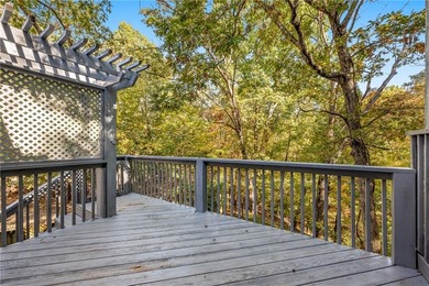 Exceptional location! This charming home backs up to Rago Trail on Bella Vista - Metfield Golf Complex and Country Club in Arkansas - for sale on GolfHomes.com, golf home, golf lot