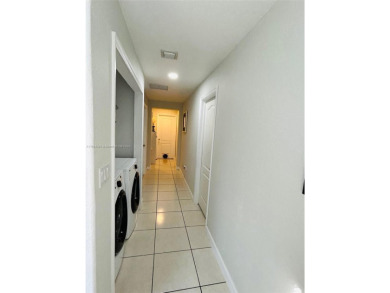 Beautiful and remodeled townhouse with 4 bedrooms and 3 full on Country Club of Miami in Florida - for sale on GolfHomes.com, golf home, golf lot