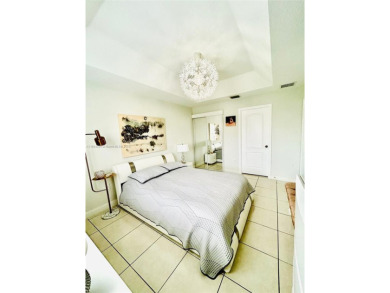 Beautiful and remodeled townhouse with 4 bedrooms and 3 full on Country Club of Miami in Florida - for sale on GolfHomes.com, golf home, golf lot