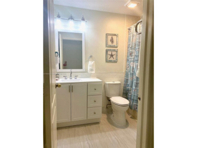 Beautiful and remodeled townhouse with 4 bedrooms and 3 full on Country Club of Miami in Florida - for sale on GolfHomes.com, golf home, golf lot