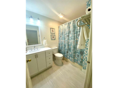 Beautiful and remodeled townhouse with 4 bedrooms and 3 full on Country Club of Miami in Florida - for sale on GolfHomes.com, golf home, golf lot