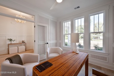 Welcome to your ideal coastal retreat! This beautiful 1.5 story on Crow Creek Golf Club in North Carolina - for sale on GolfHomes.com, golf home, golf lot