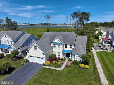 Enjoy stunning views of the natural wetlands and open bay from on Bethany Bay Golf Club in Delaware - for sale on GolfHomes.com, golf home, golf lot